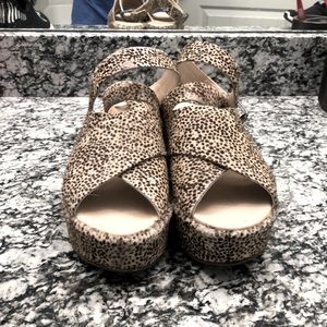 Matisse wedged animal print shoes. Absolutely adorable and only worn twice.